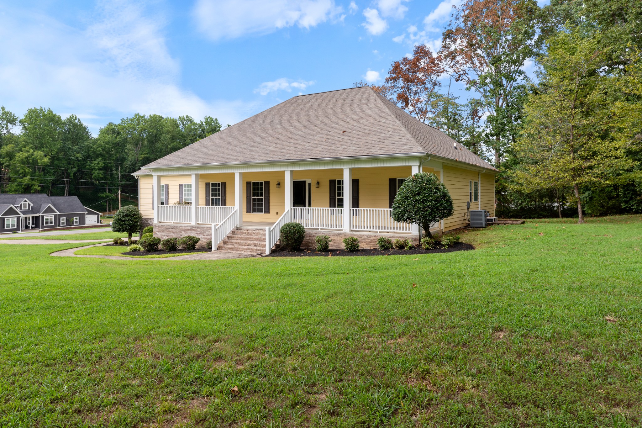 100 Kimberly Way Dickson, TN 37055 - Photo 2 of 34 a front view of house with yard and green space