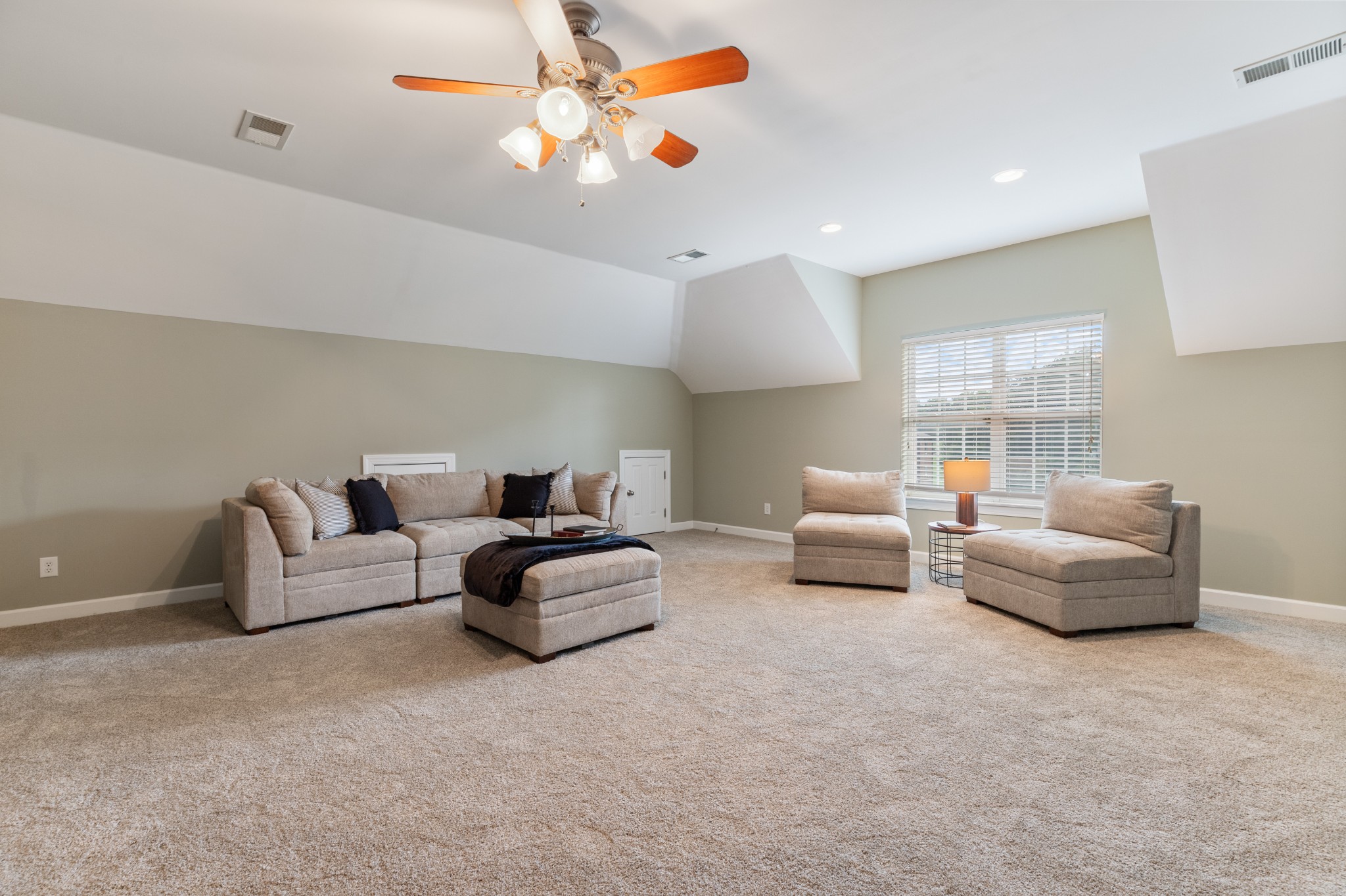 100 Kimberly Way Dickson, TN 37055 - Photo 21 of 34 a living room with furniture and a chandelier
