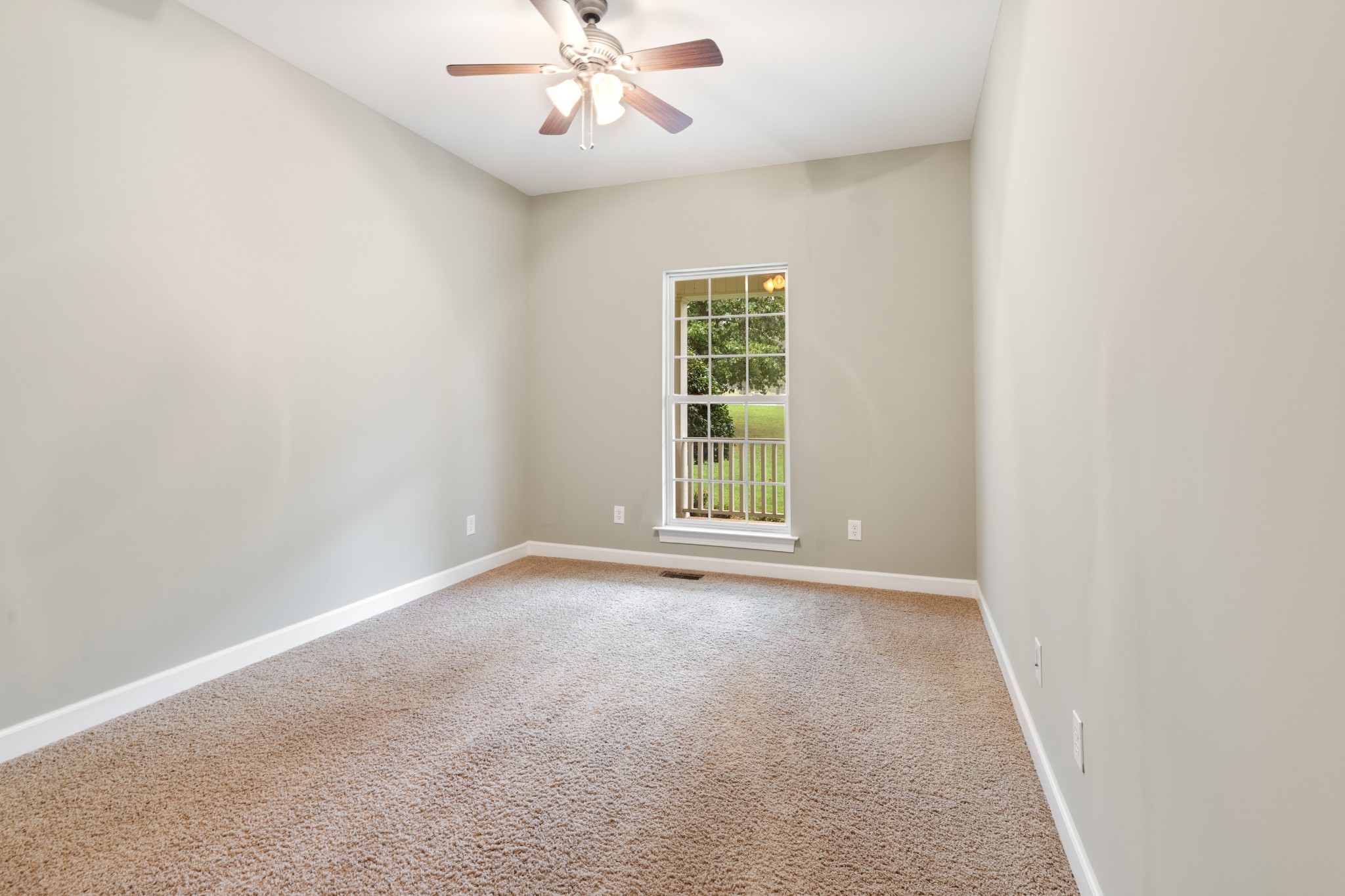 100 Kimberly Way Dickson, TN 37055 - Photo 24 of 34 an empty room with windows and fan