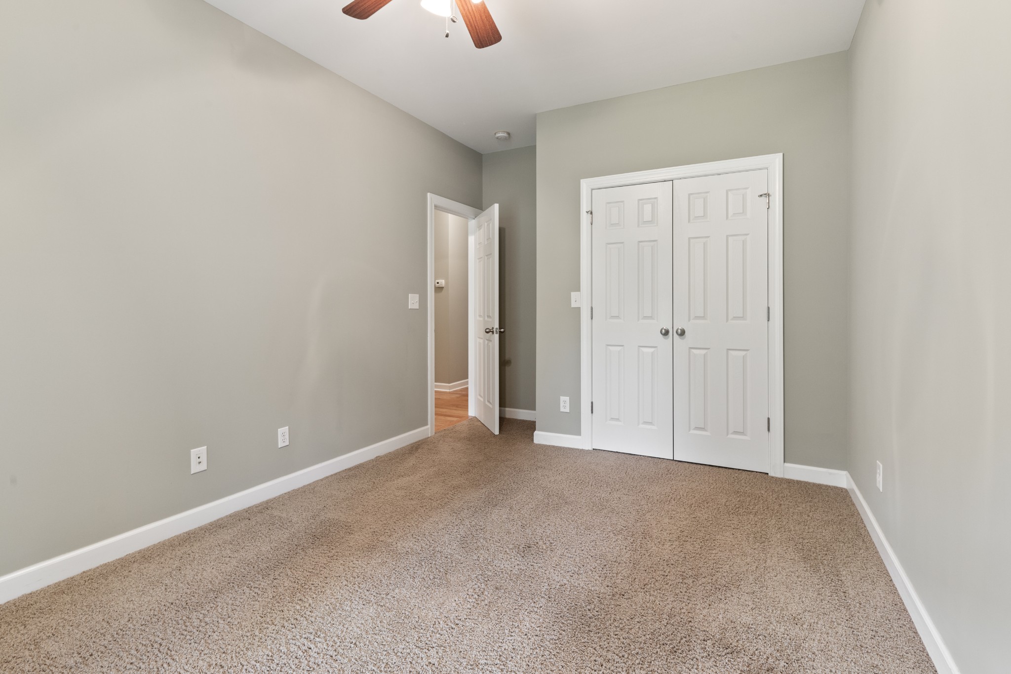 100 Kimberly Way Dickson, TN 37055 - Photo 26 of 34 an empty room with closet and windows