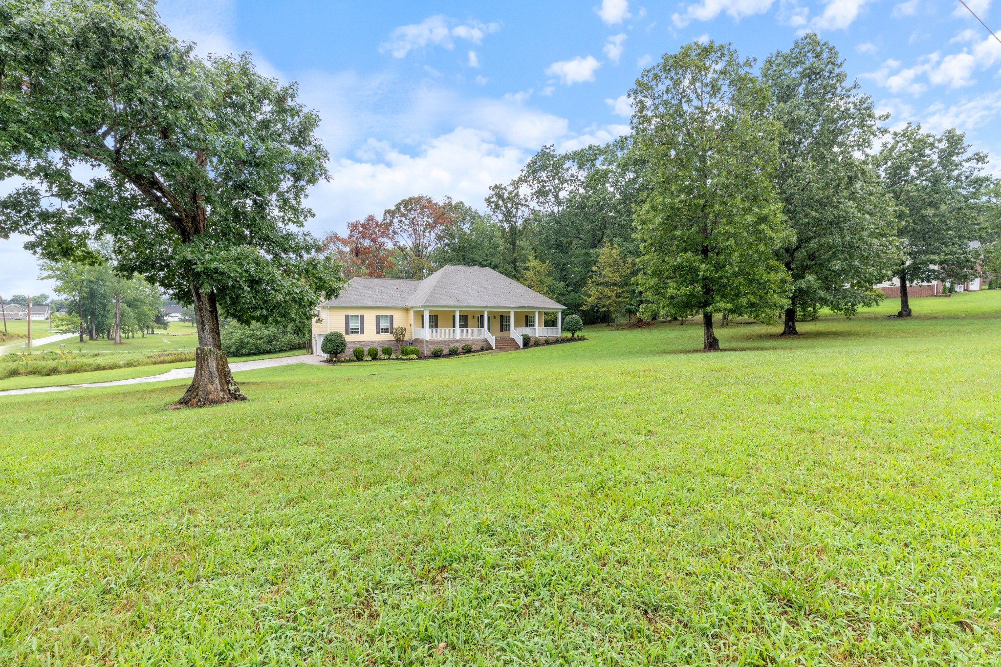 100 Kimberly Way Dickson, TN 37055 - Photo 5 of 34 a view of a house with yard and tree s