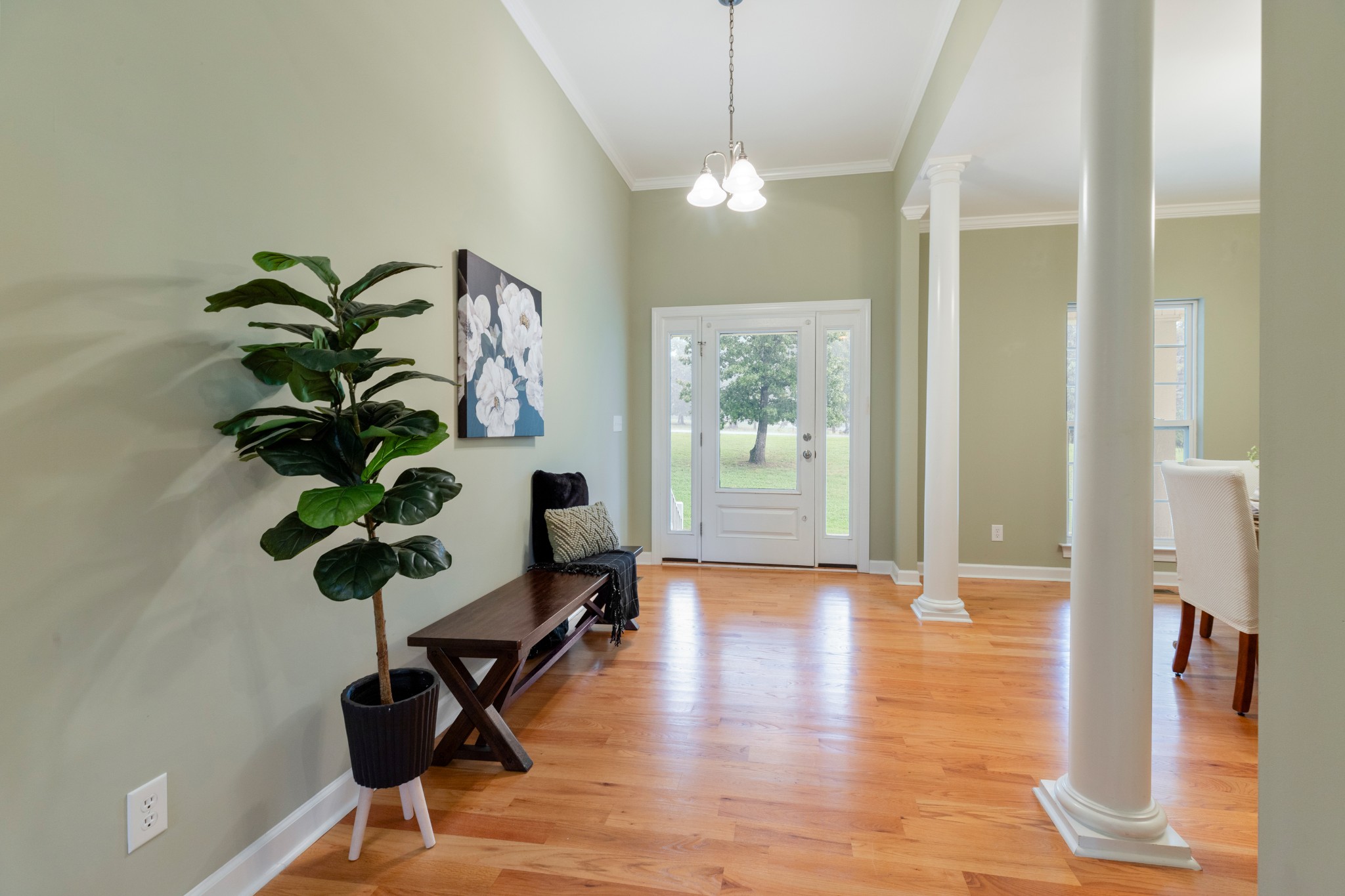 100 Kimberly Way Dickson, TN 37055 - Photo 7 of 34 a view of a workspace with furniture and a chandelier