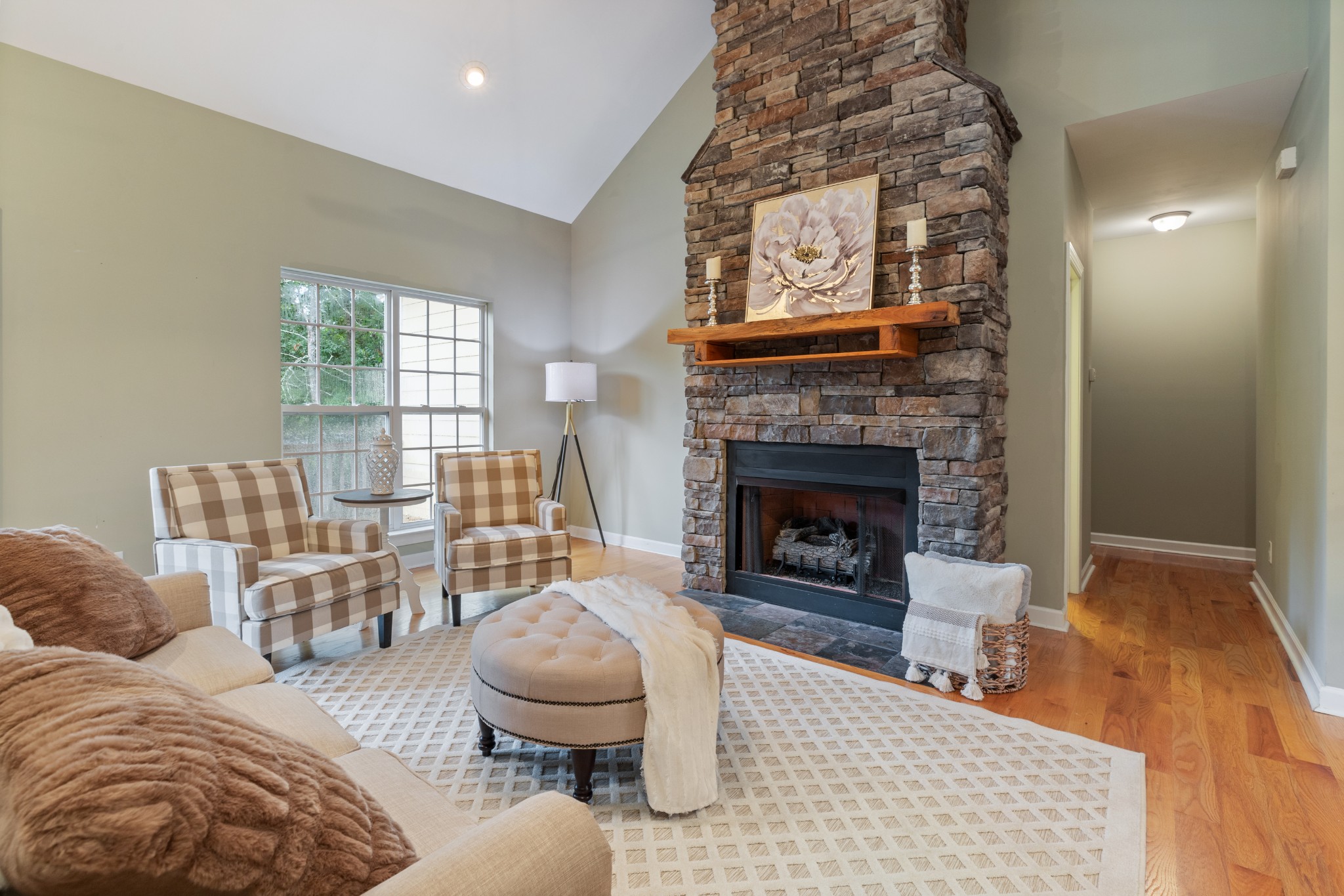 100 Kimberly Way Dickson, TN 37055 - Photo 9 of 34 a living room with furniture a window and a fireplace
