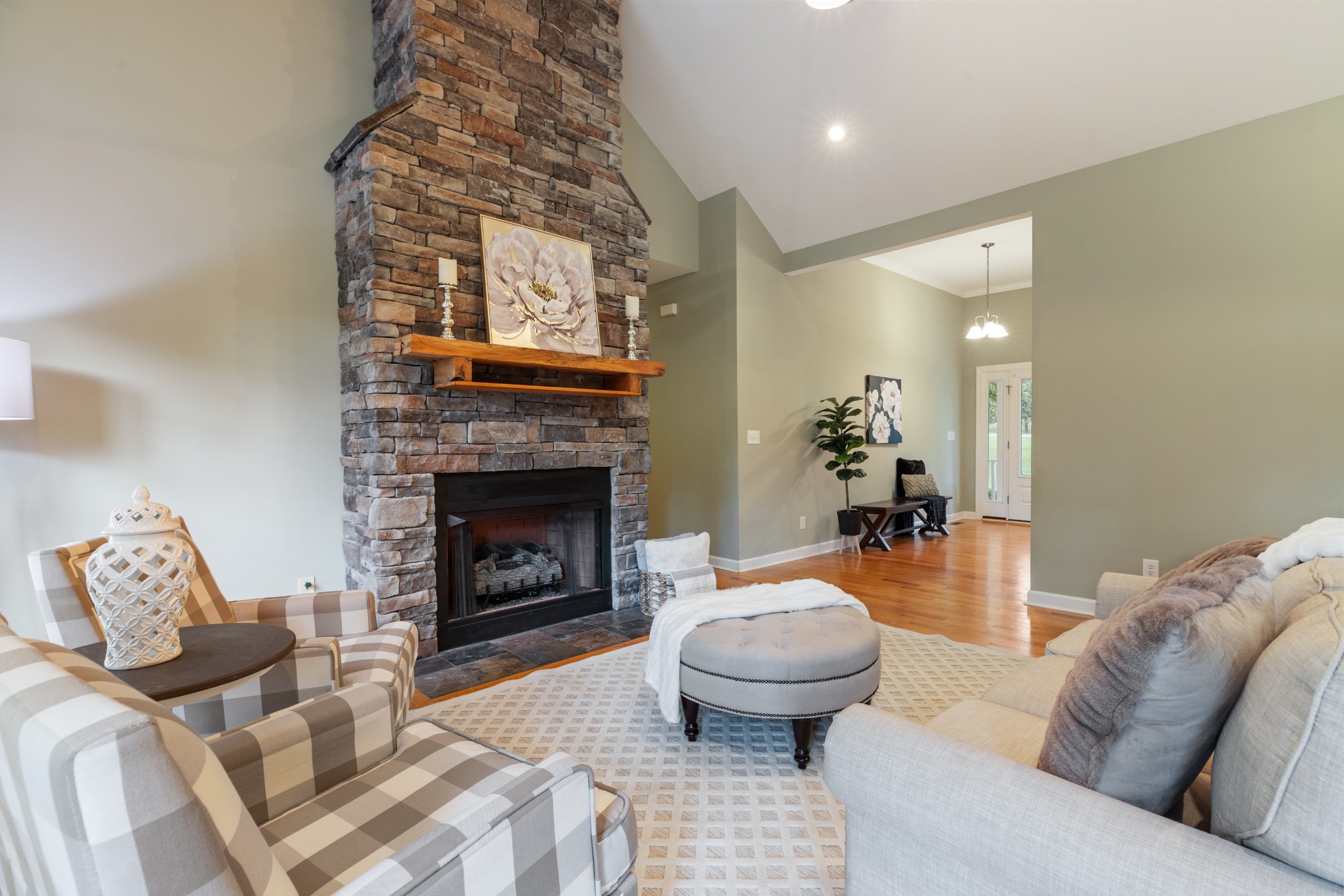 100 Kimberly Way Dickson, TN 37055 - Photo 10 of 34 a living room with furniture and a fireplace