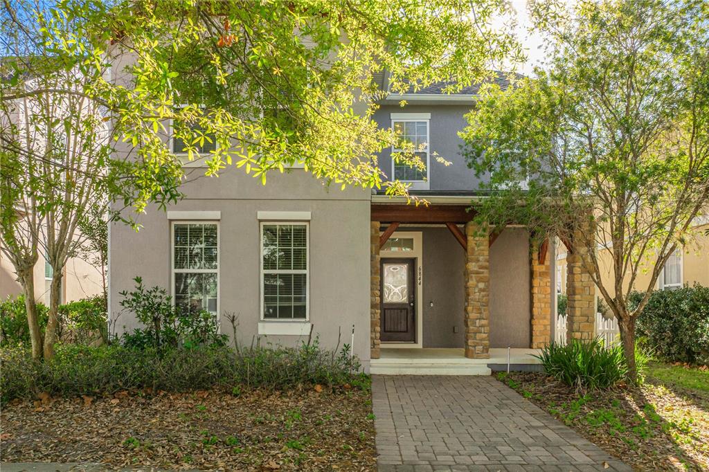 6844 Sundrop Street Harmony, FL 34773 - Photo 2 of 67 front view of a house