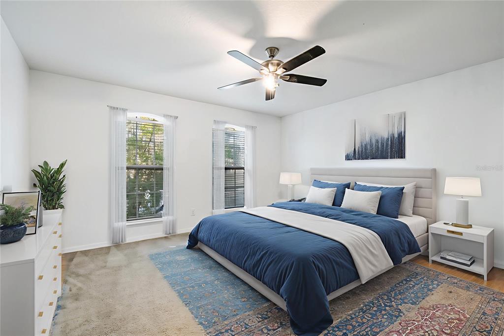 6844 Sundrop Street Harmony, FL 34773 - Photo 30 of 67 a bedroom with a large bed and a window