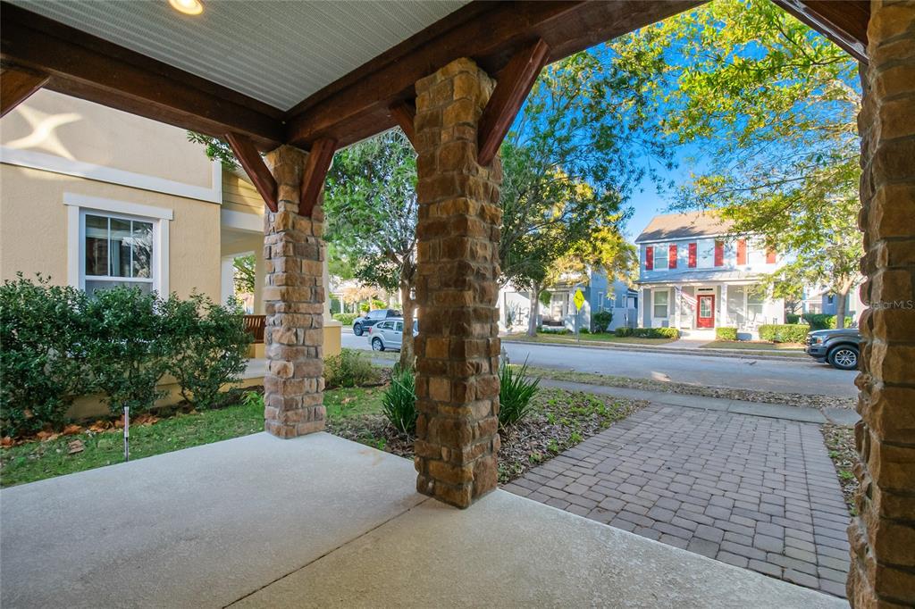 6844 Sundrop Street Harmony, FL 34773 - Photo 3 of 67 a front view of a house with garden