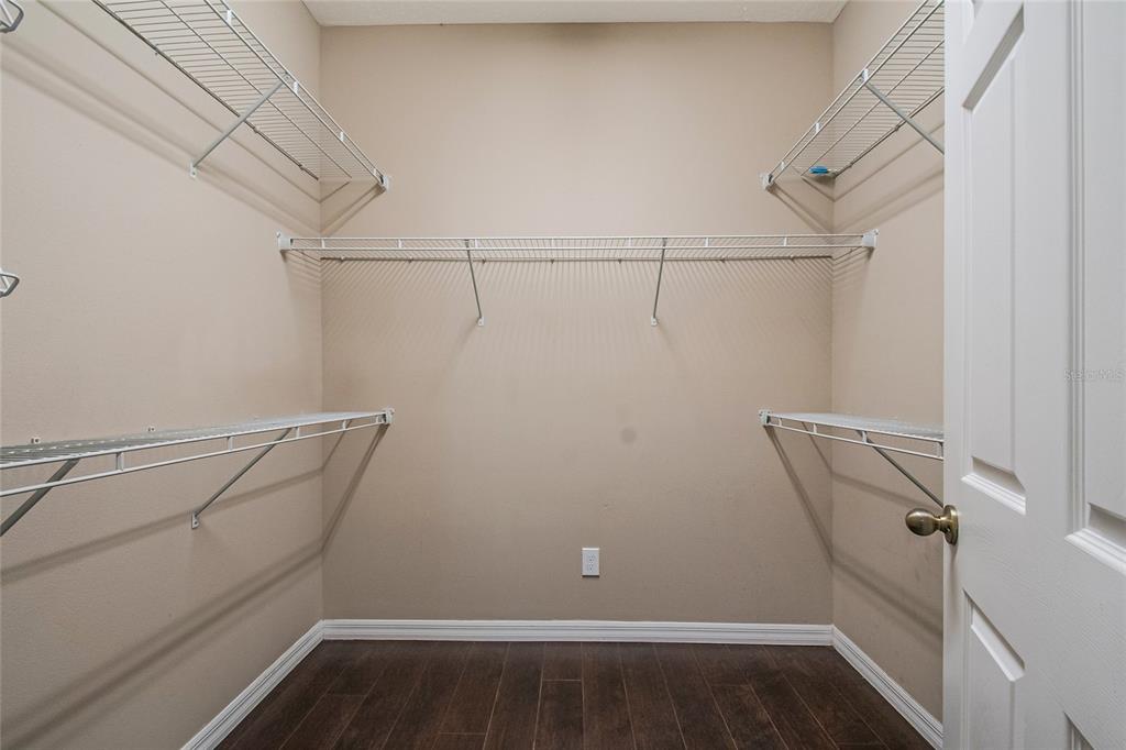 6844 Sundrop Street Harmony, FL 34773 - Photo 34 of 67 a view of small space with racks on the wall