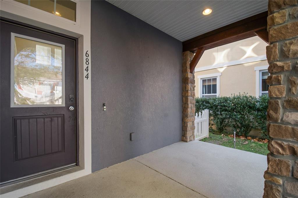 6844 Sundrop Street Harmony, FL 34773 - Photo 4 of 67 a balcony view with a outdoor space