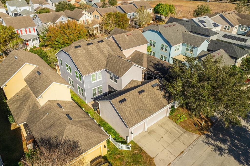 6844 Sundrop Street Harmony, FL 34773 - Photo 51 of 67 an aerial view of a house with outdoor space