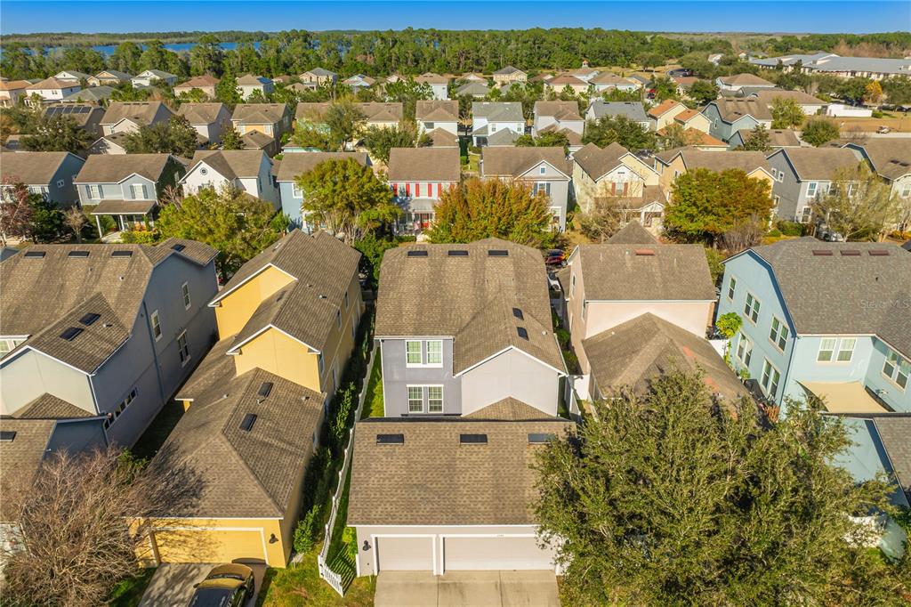 6844 Sundrop Street Harmony, FL 34773 - Photo 66 of 67 an aerial view of residential houses with outdoor space