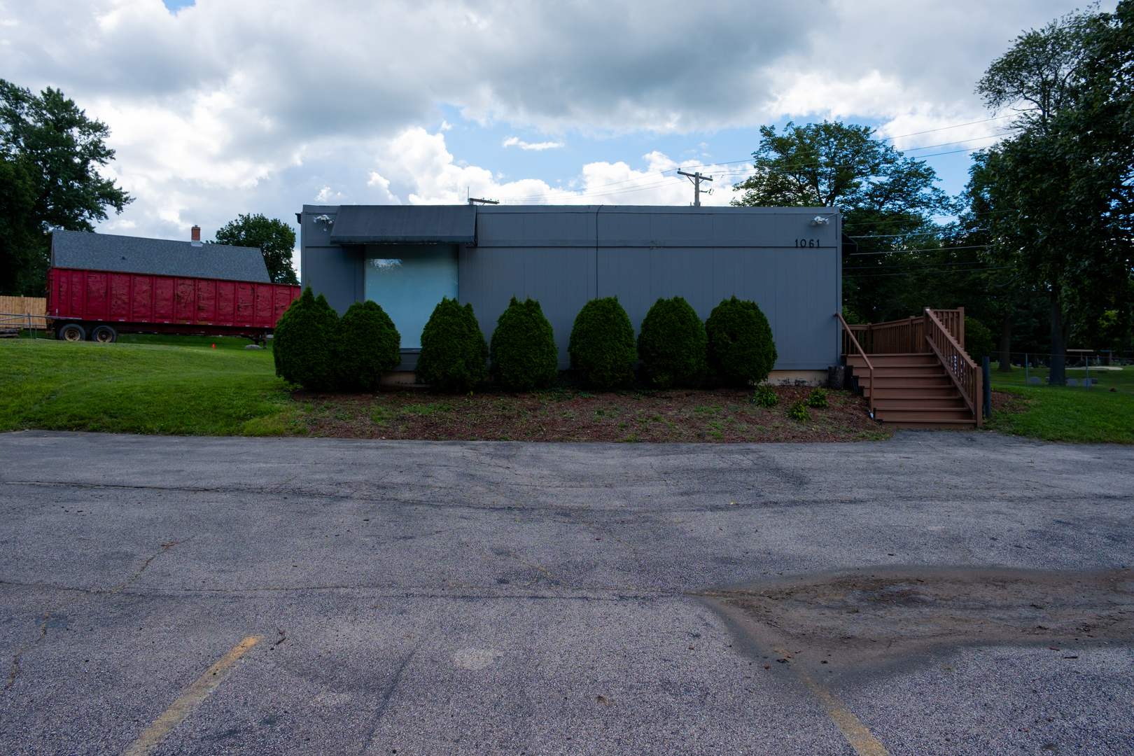 1061 Villa Street Elgin, IL 60120 - Photo 3 of 7 a view of a house with a yard and garage