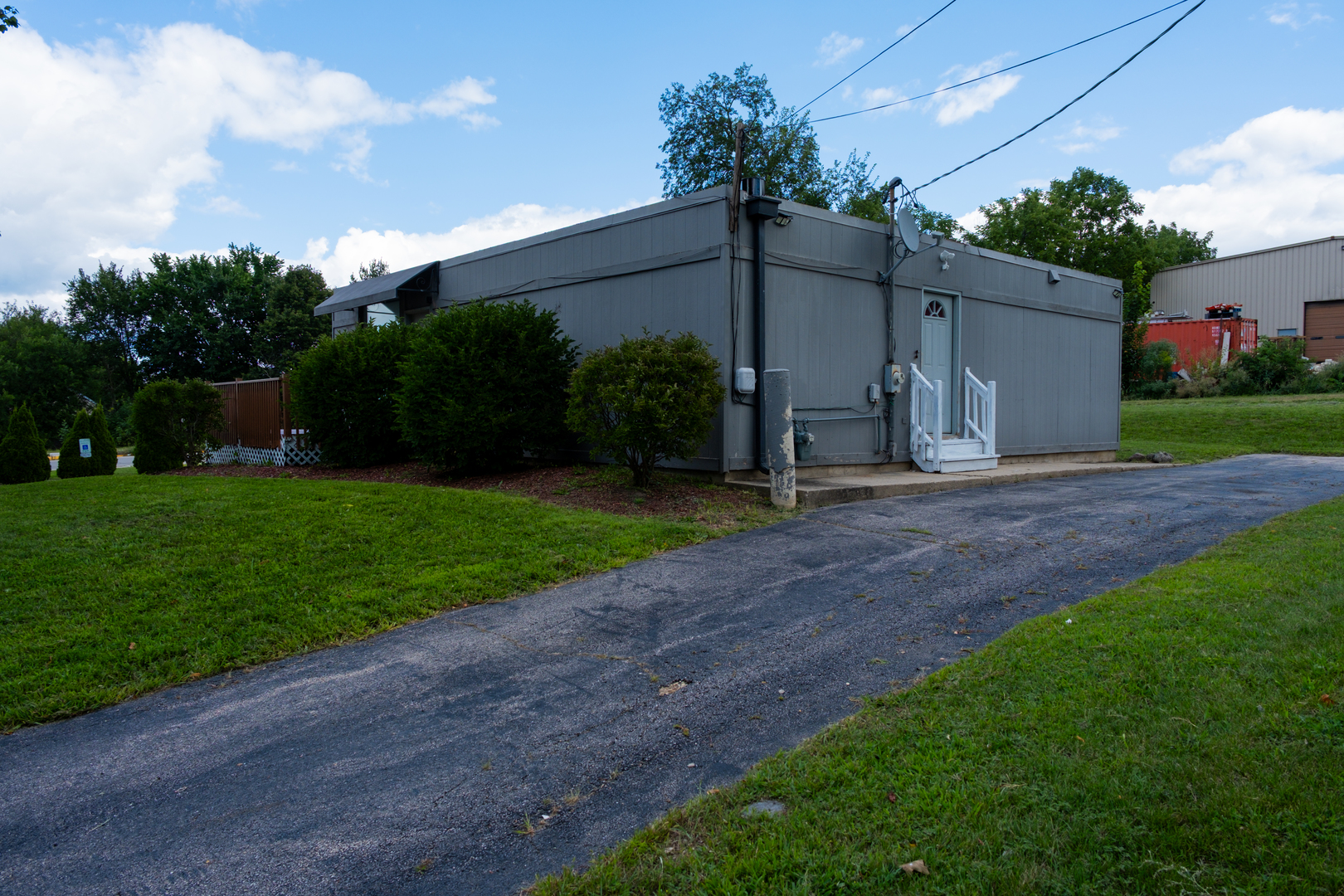 1061 Villa Street Elgin, IL 60120 - Photo 6 of 7 a view of a house with backyard and a tree