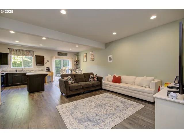 a living room with furniture and a couch