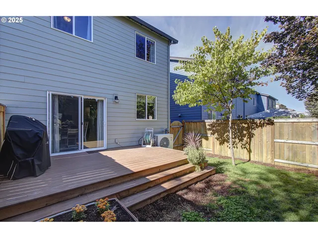 a view of a chairs and table in a patio