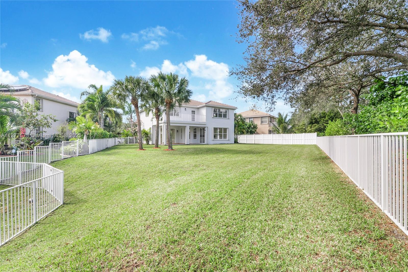 Silver Falls Miramar, FL 33027 - Photo 12 of 46 a view of a house with a yard