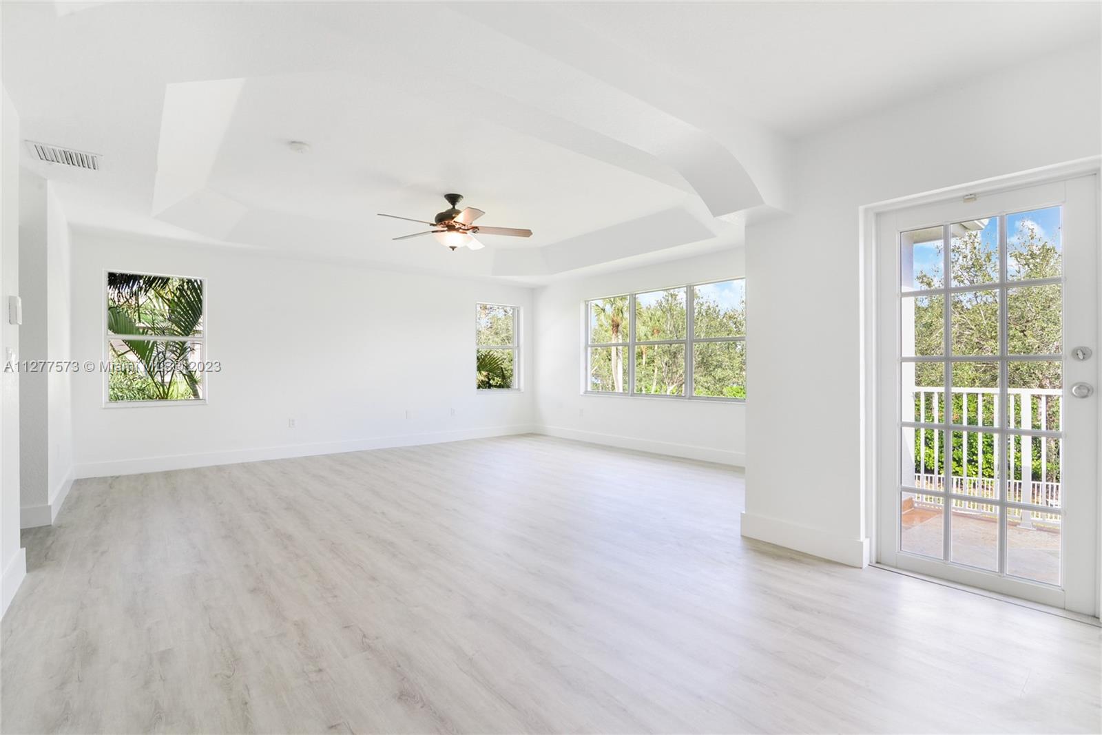 Silver Falls Miramar, FL 33027 - Photo 15 of 46 wooden floor in an empty room with a window