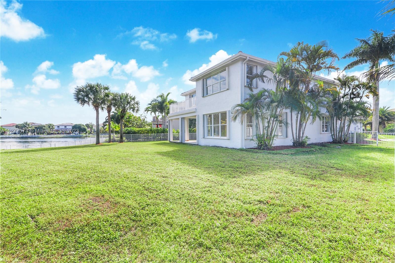 Silver Falls Miramar, FL 33027 - Photo 29 of 46 a view of a house with a yard