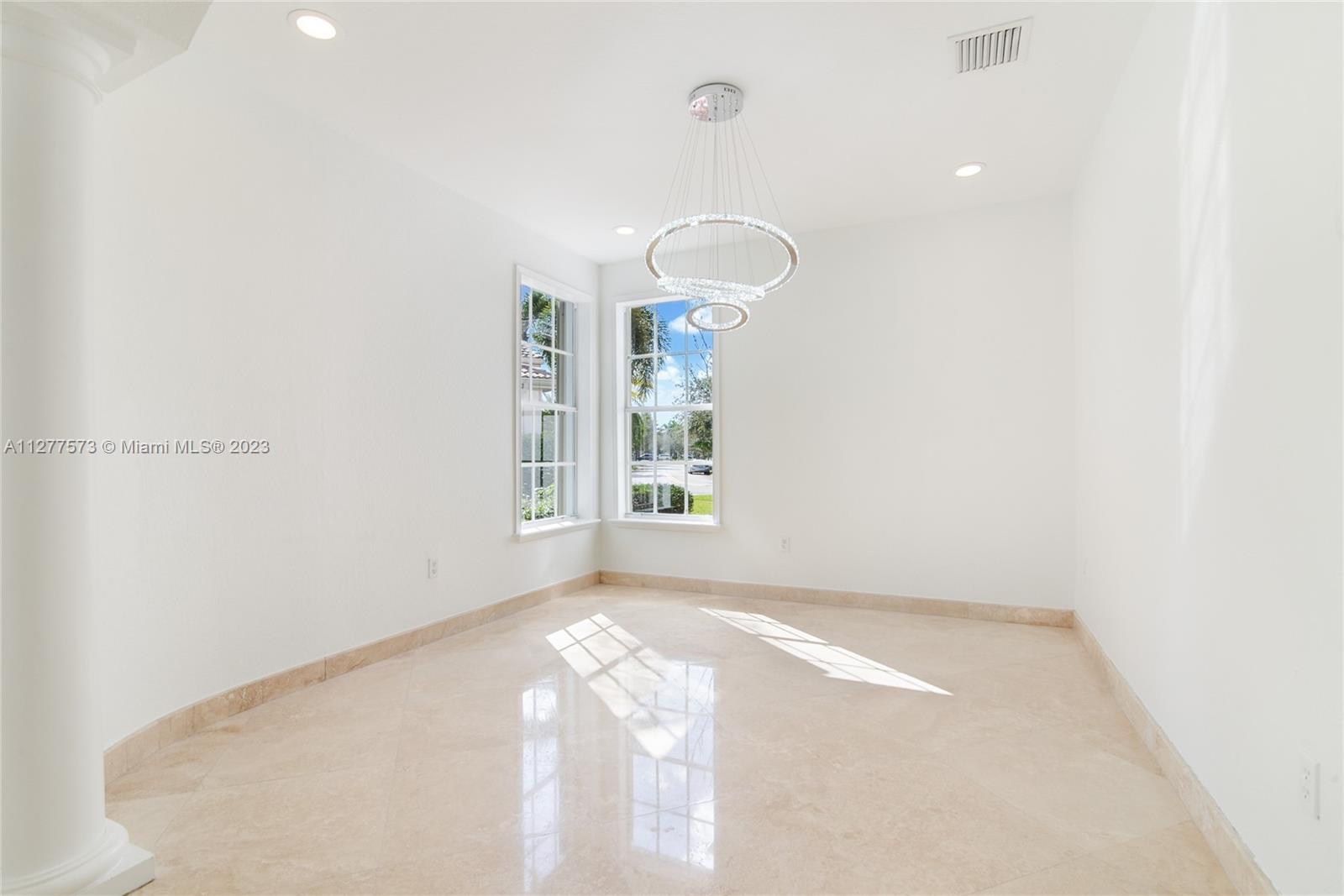 Silver Falls Miramar, FL 33027 - Photo 4 of 46 an empty room with windows