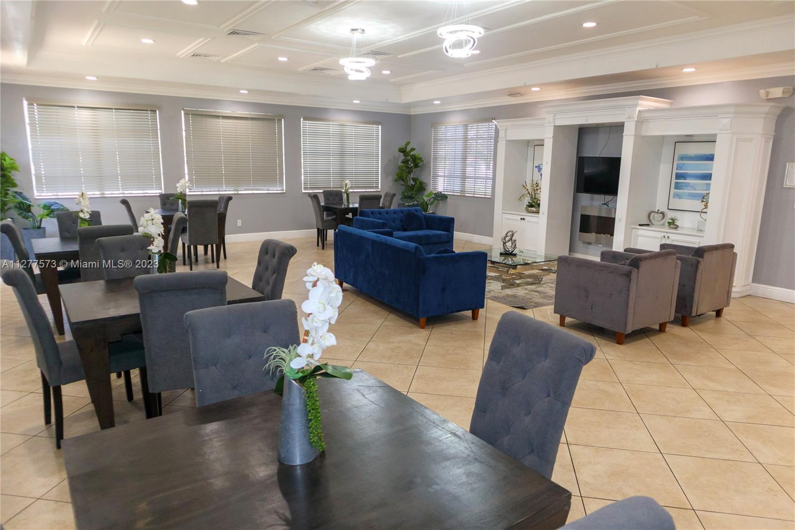 Silver Falls Miramar, FL 33027 - Photo 43 of 46 a living room with furniture and a large window