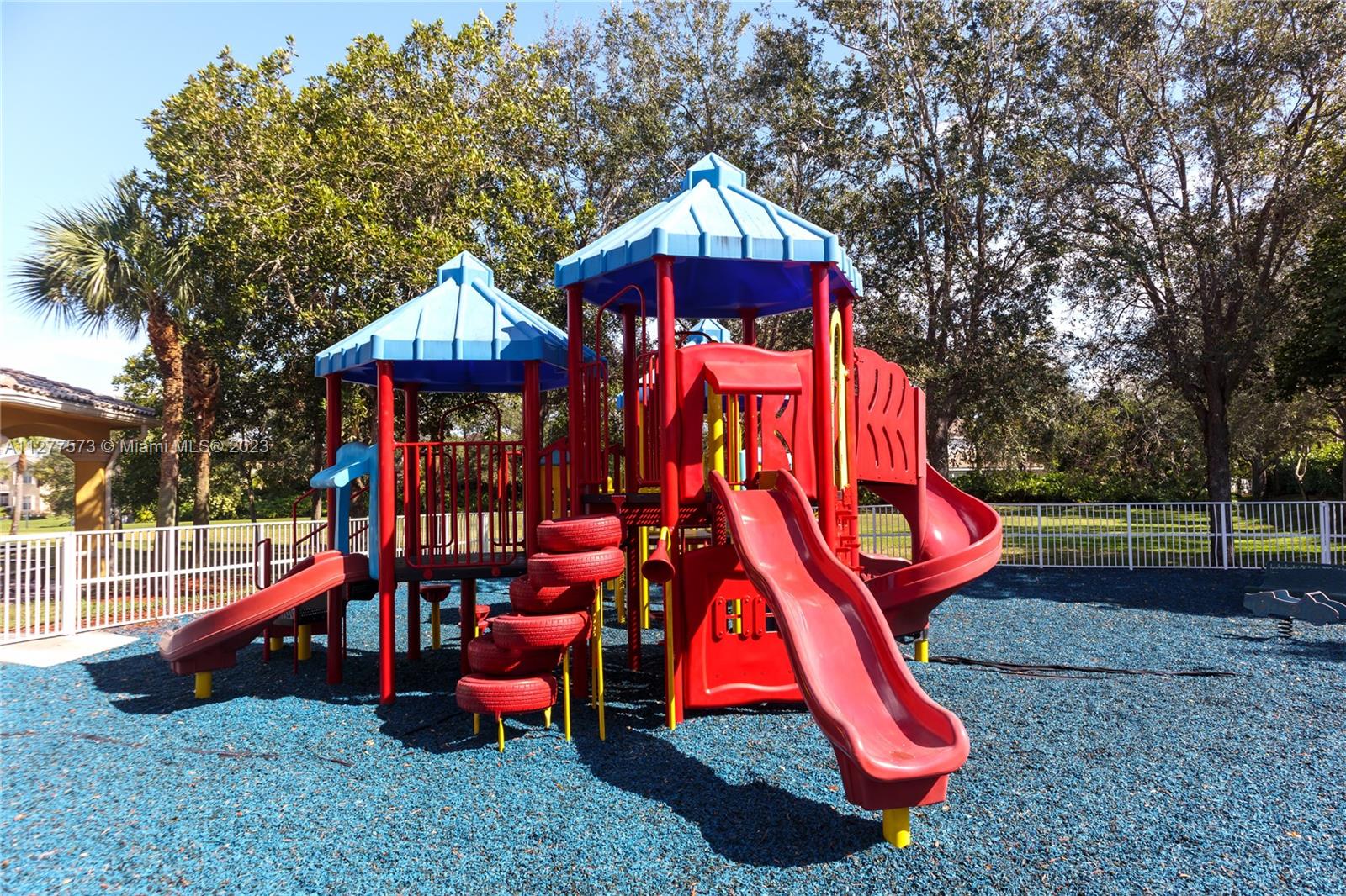 Silver Falls Miramar, FL 33027 - Photo 44 of 46 a view of playground with a slide and swing