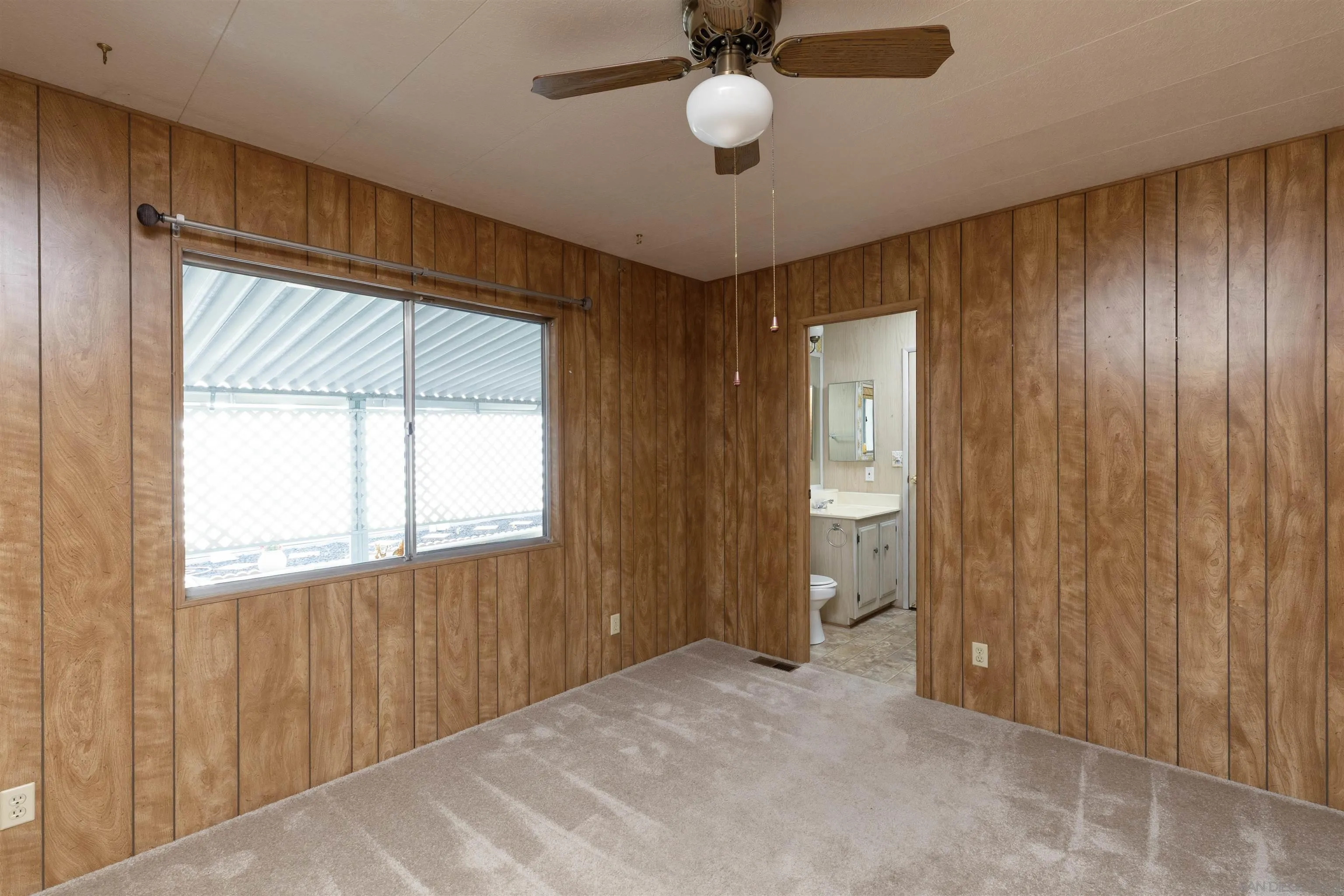 275 South Worthington Street, Unit 105 Spring Valley, CA 91977 - Photo 16 of 25 a view of an empty room with a window and closet area