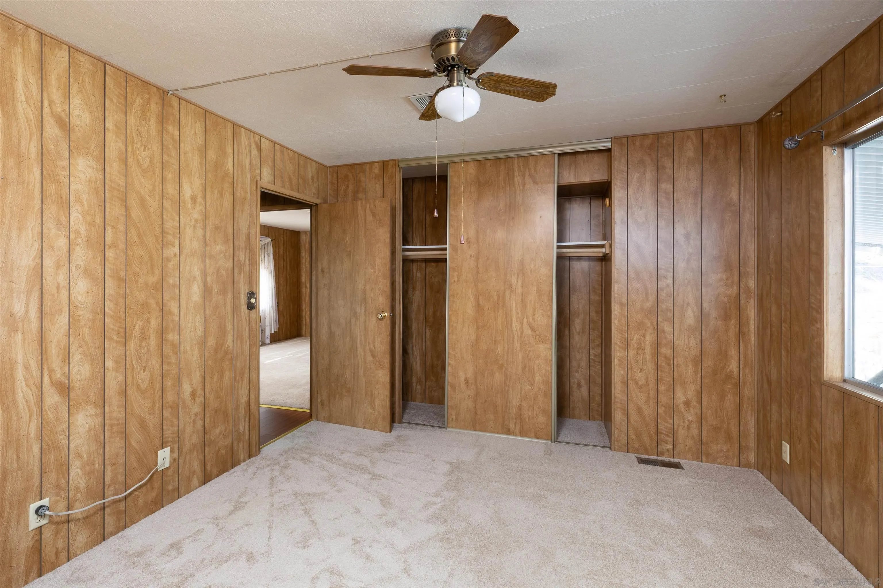 275 South Worthington Street, Unit 105 Spring Valley, CA 91977 - Photo 17 of 25 a view of empty room with ceiling fan