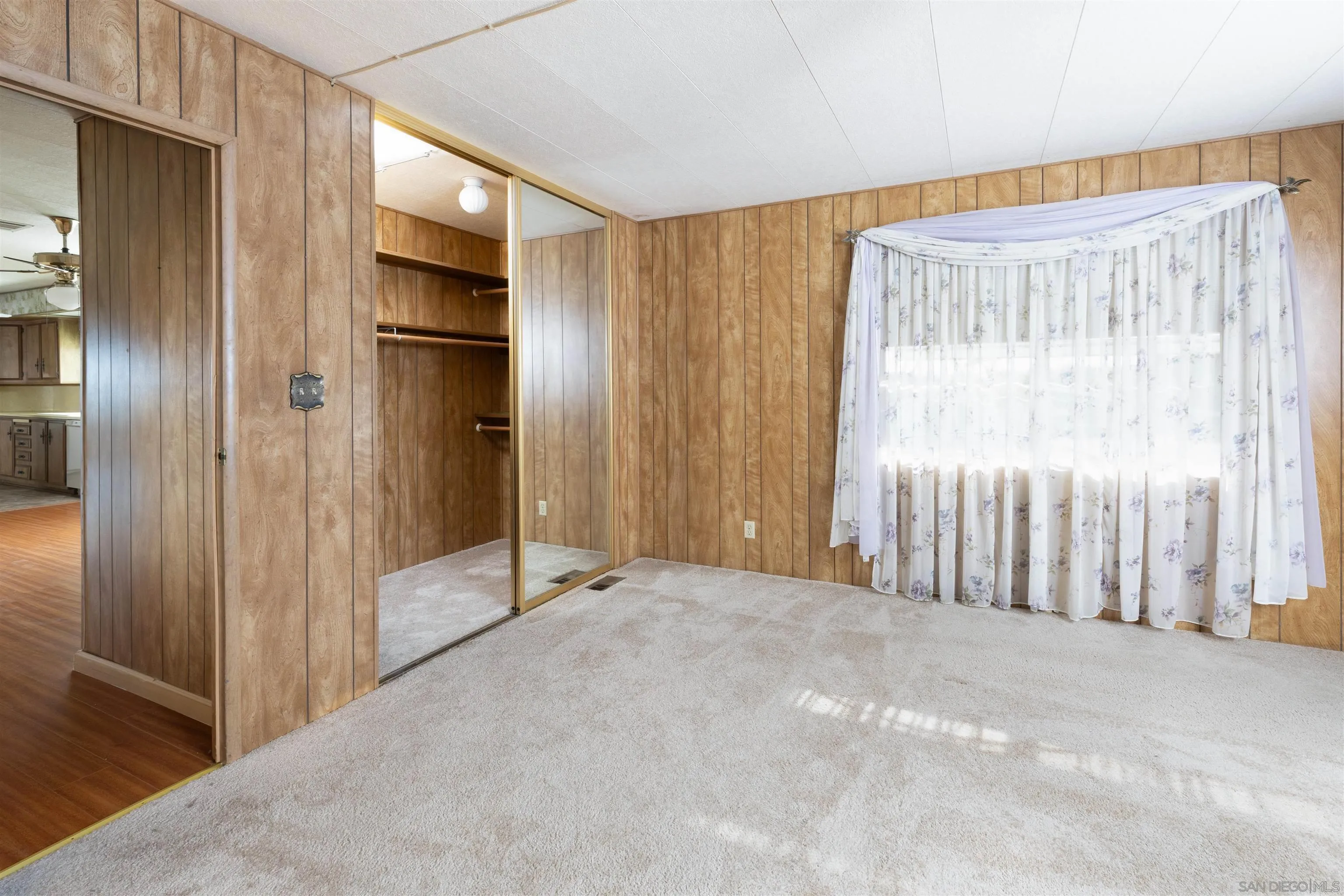 275 South Worthington Street, Unit 105 Spring Valley, CA 91977 - Photo 21 of 25 a view of an empty room with a window
