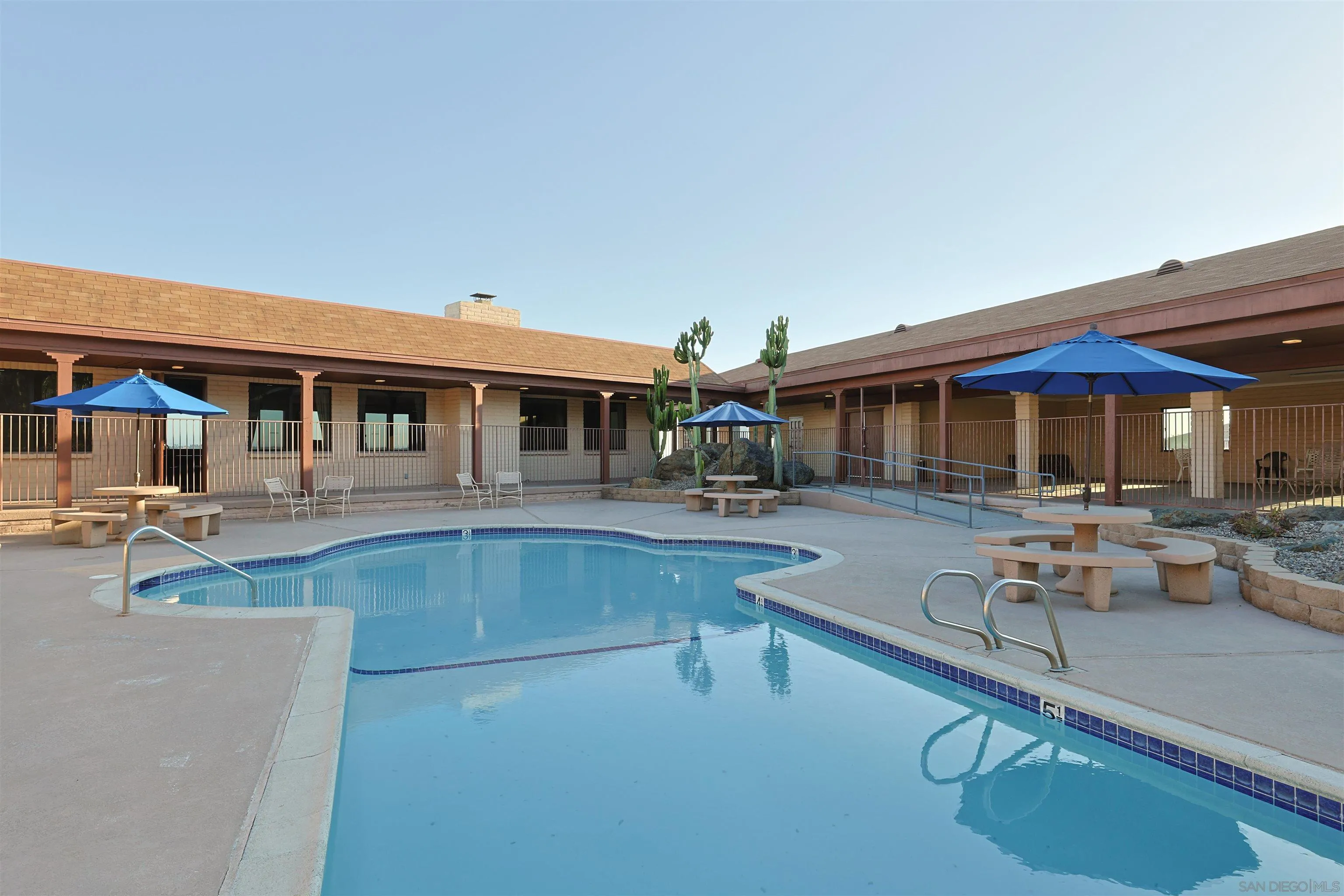 275 South Worthington Street, Unit 105 Spring Valley, CA 91977 - Photo 24 of 25 a view of a house with swimming pool and sitting area
