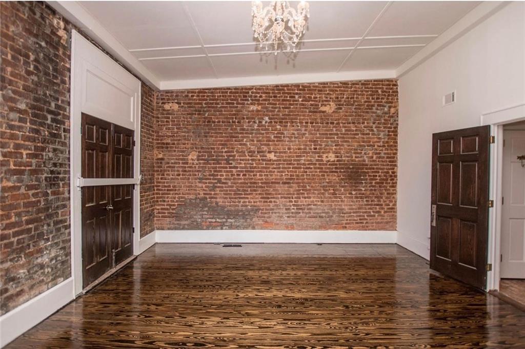 145 South Cherokee Road Social Circle, GA 30025 - Photo 12 of 13 a view of empty room with wooden floor