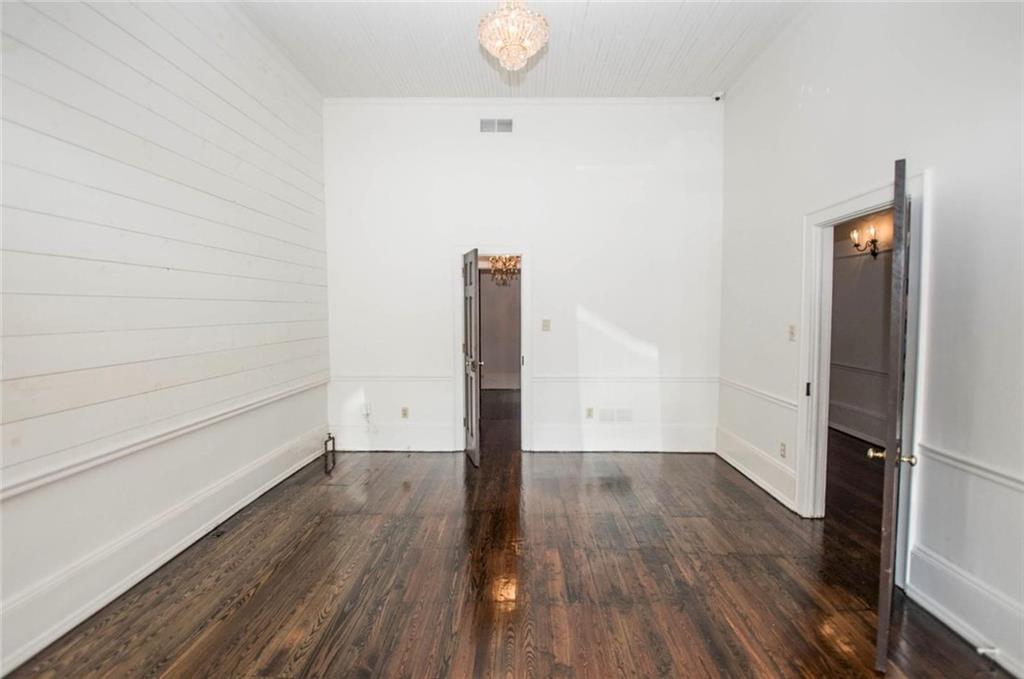 145 South Cherokee Road Social Circle, GA 30025 - Photo 7 of 13 a view of empty room with wooden floor