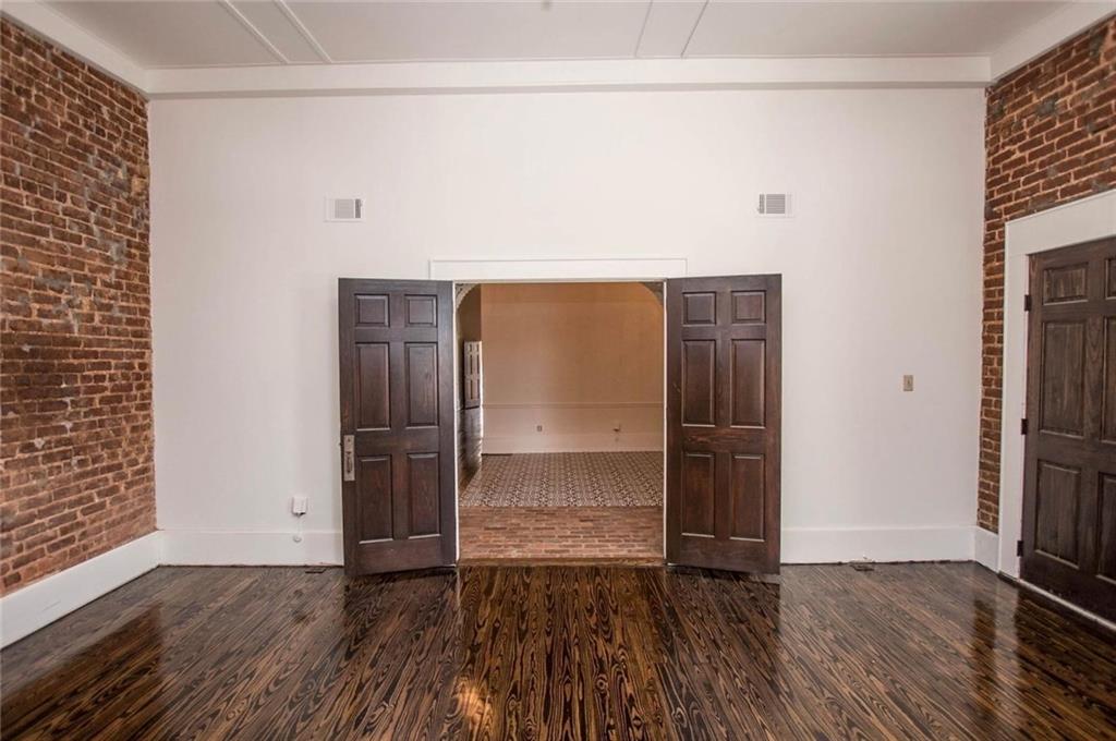 145 South Cherokee Road Social Circle, GA 30025 - Photo 10 of 13 a view of empty room with wooden floor and fan