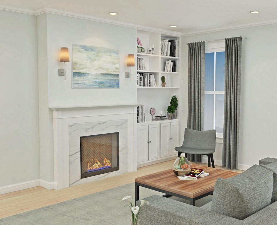 6 Spring Street, Unit 1 Somerville, MA 02143 - Photo 2 of 3 a living room with furniture and a fireplace