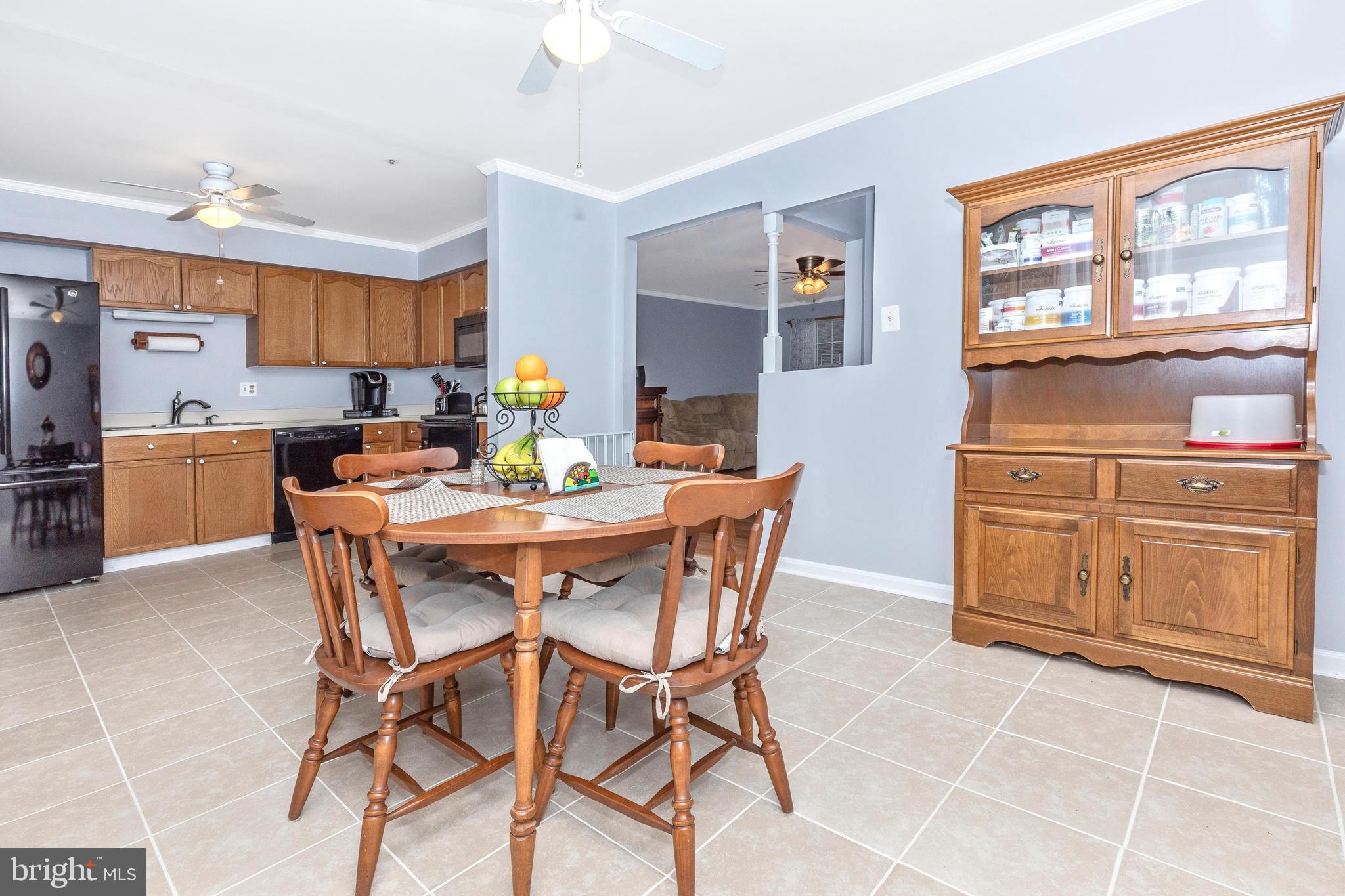 25752 Woodfield Road Damascus, MD 20872 - Photo 13 of 43 Ceramic til floor in large dining area