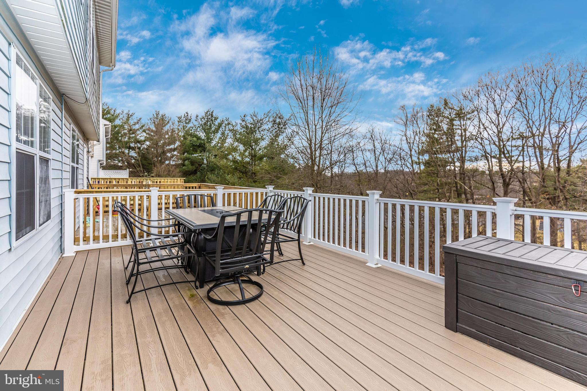 25752 Woodfield Road Damascus, MD 20872 - Photo 35 of 43 Trex deck off Kitchen