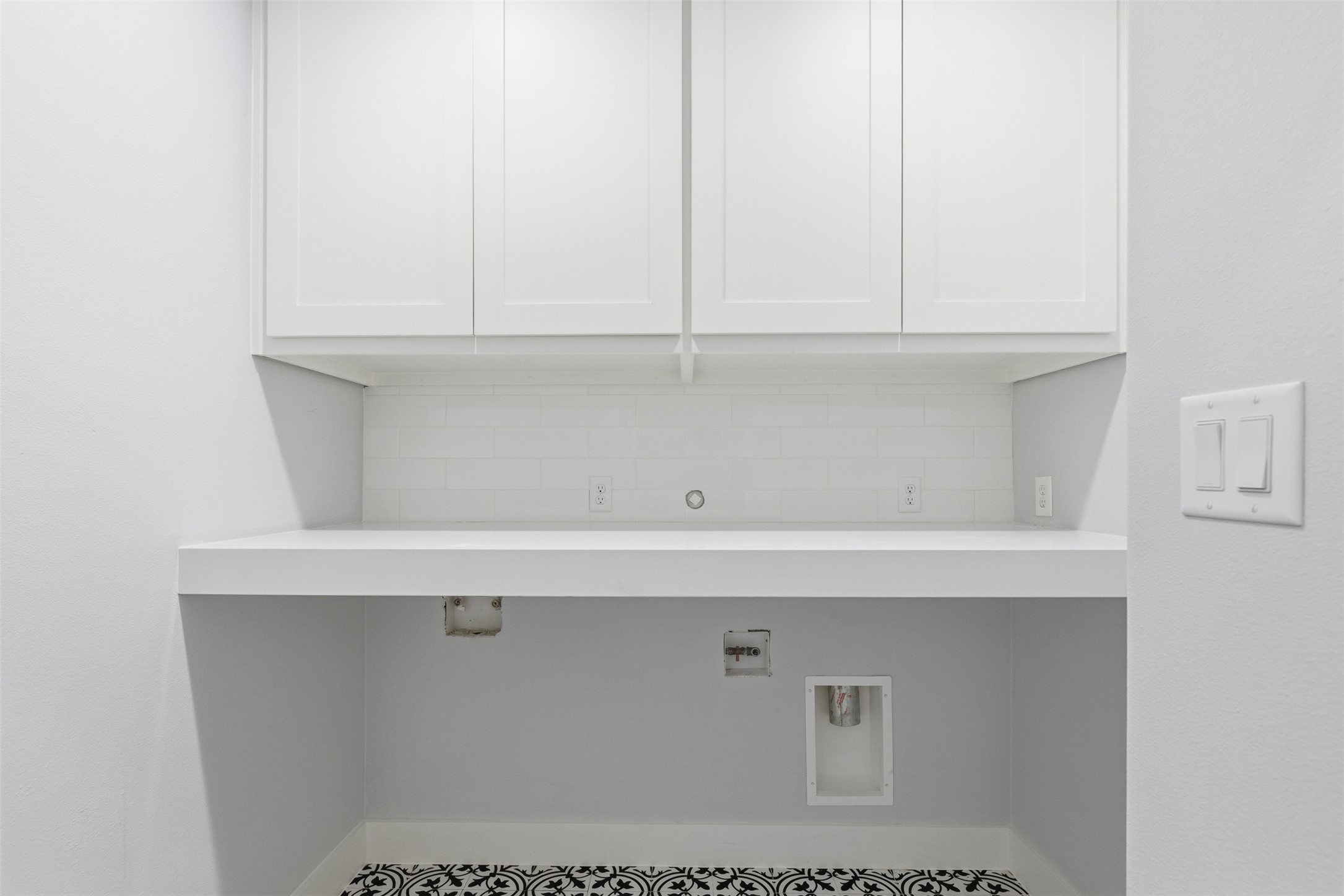 1018 Press Street Houston, TX 77020 - Photo 24 of 31 Practical utility room designed for easy laundry days and extra storage.