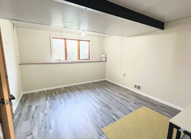 a view of a storage room with shelves