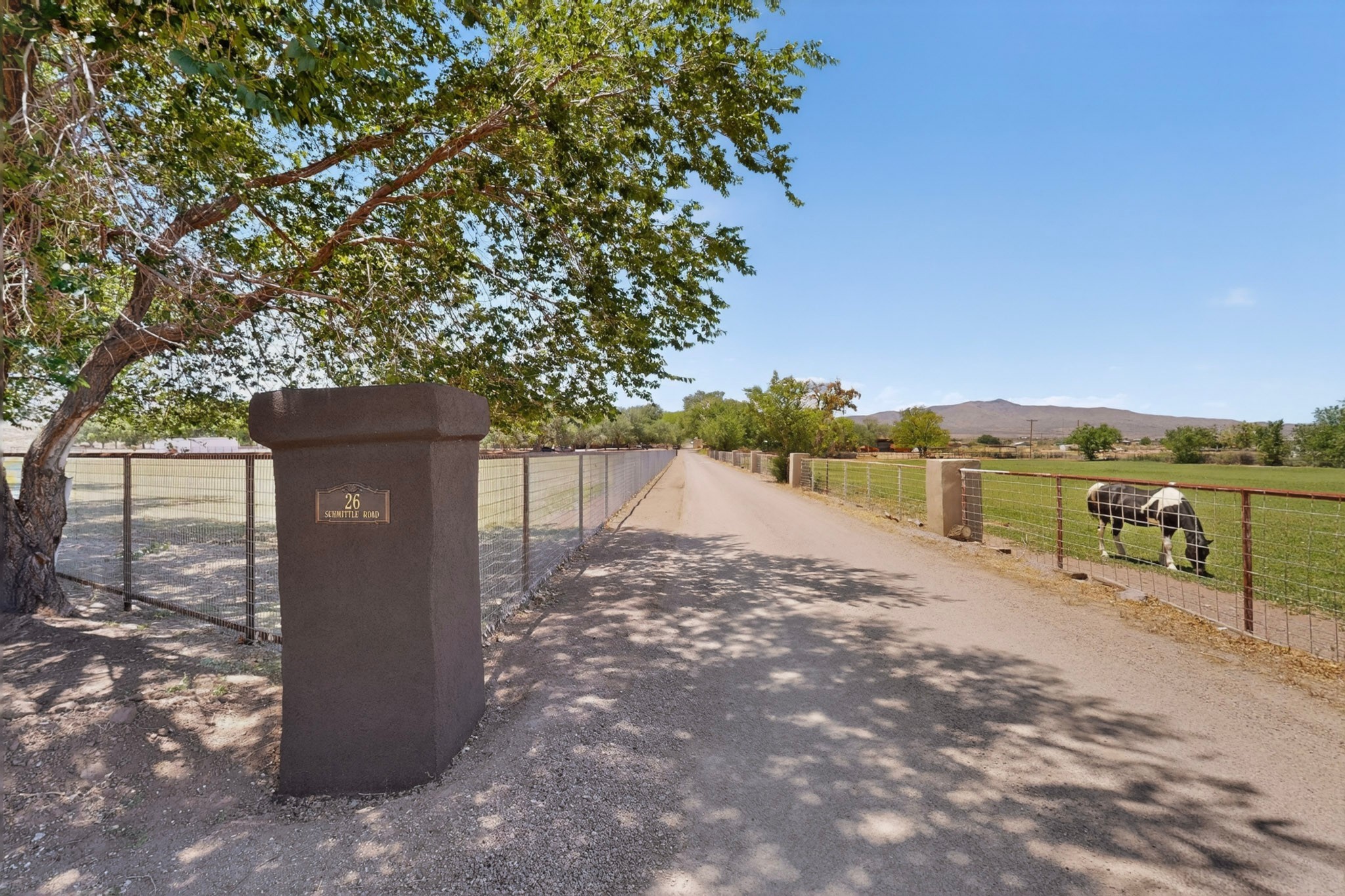 26 Schmittle Road Socorro, NM 87801 - Photo 3 of 80 New stucco pillar with address is located at the east end of the property on Schmittle Road