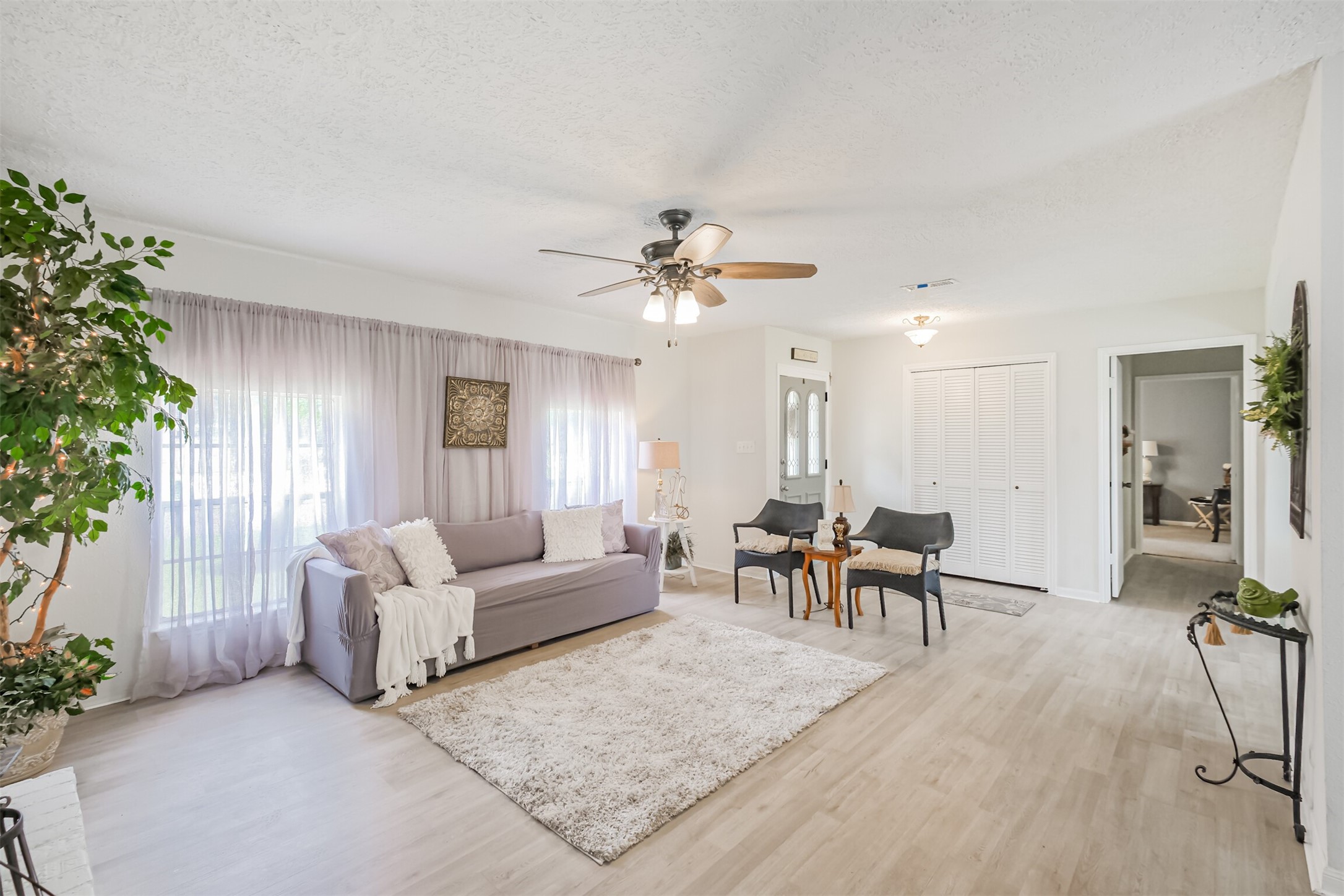 2705 Parrott Avenue Rosenberg, TX 77471 - Photo 7 of 37 a living room with furniture and a large window
