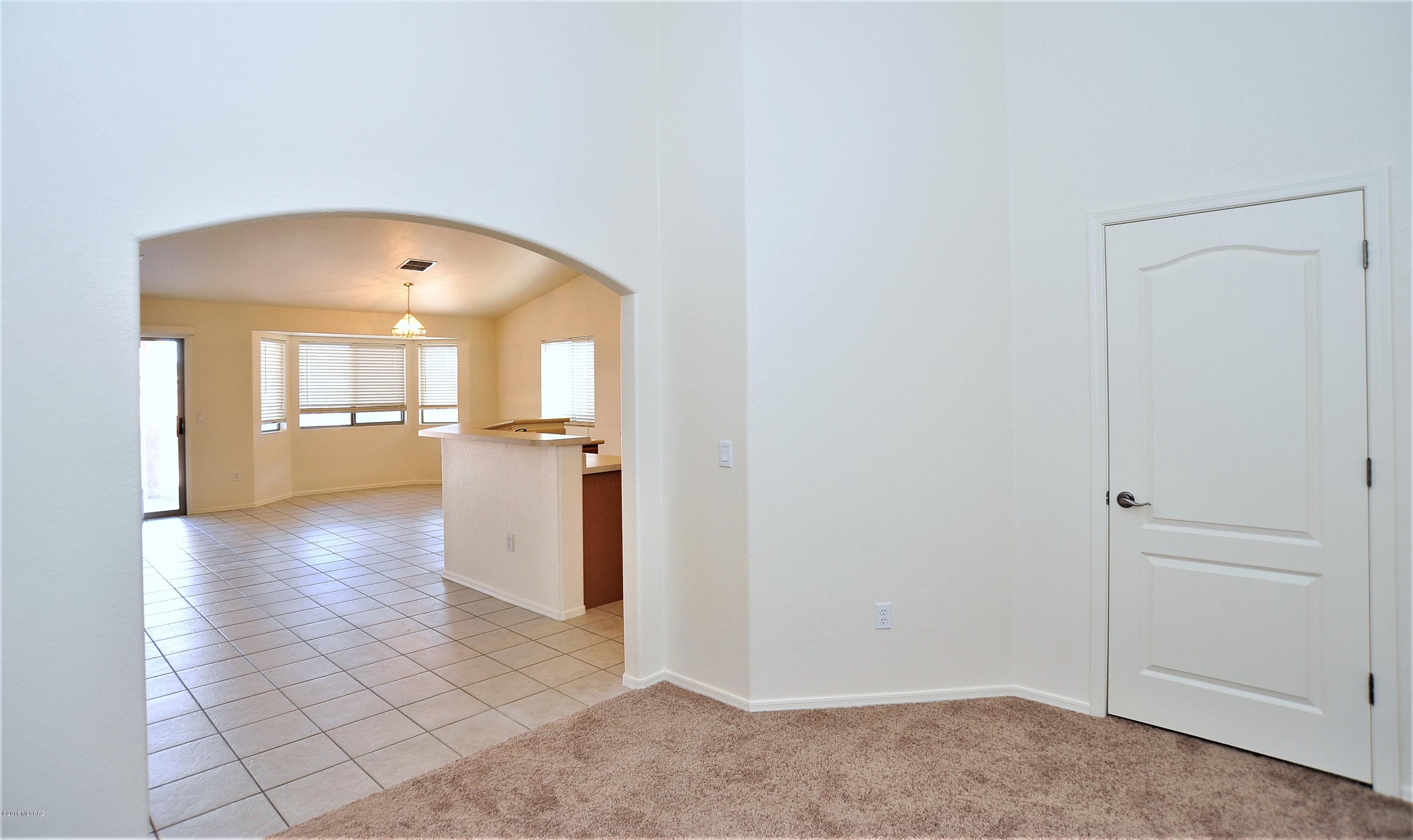 558 West Chatfield Street Vail, AZ 85641 - Photo 13 of 31 a view of a kitchen cabinets and wooden floor