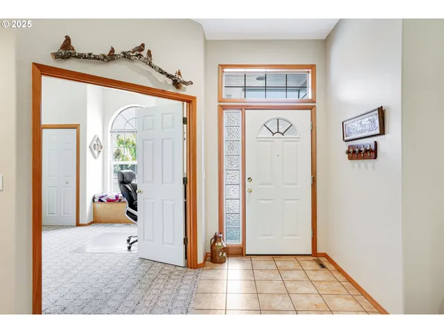 a view of a hallway and a entryway door