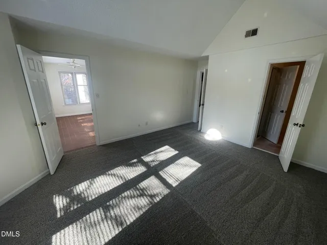 a bathroom with a sink a toilet and a shower