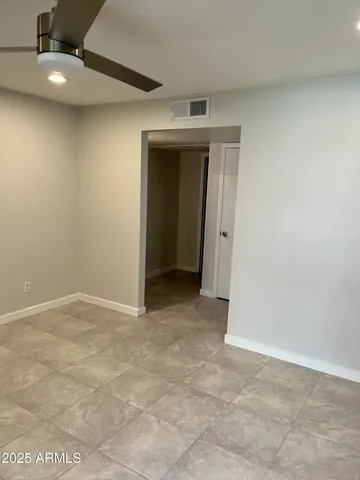 an empty room with a bathroom