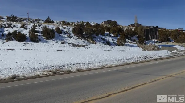a view of a sink with granite top