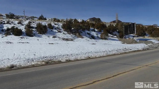 a view of a sink with granite top
