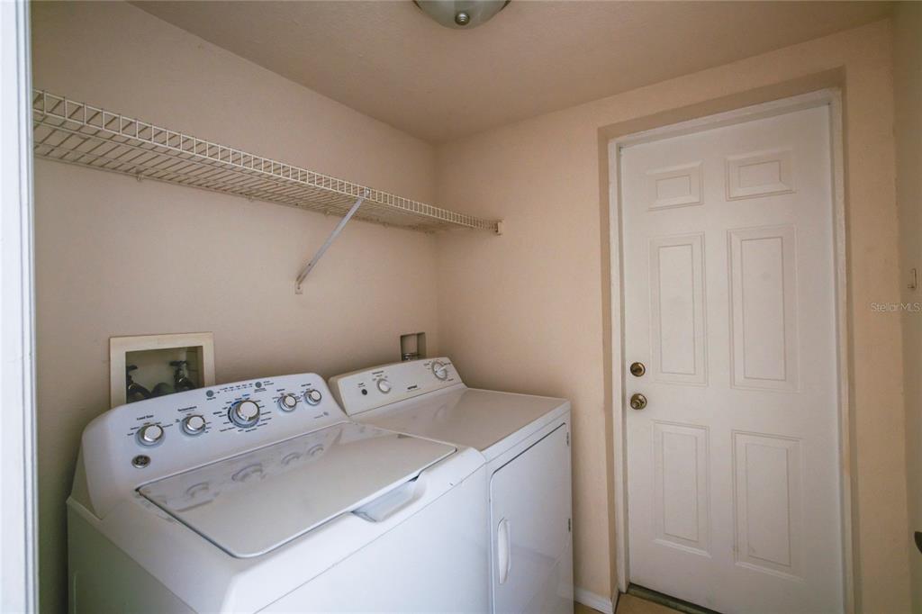 823 Camargo Way, Unit 101 Altamonte Springs, FL 32714 - Photo 6 of 20 a utility room with dryer and washer
