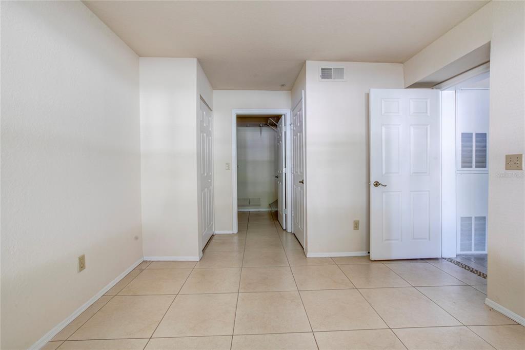 823 Camargo Way, Unit 101 Altamonte Springs, FL 32714 - Photo 8 of 20 a view of an empty room with closet and a window