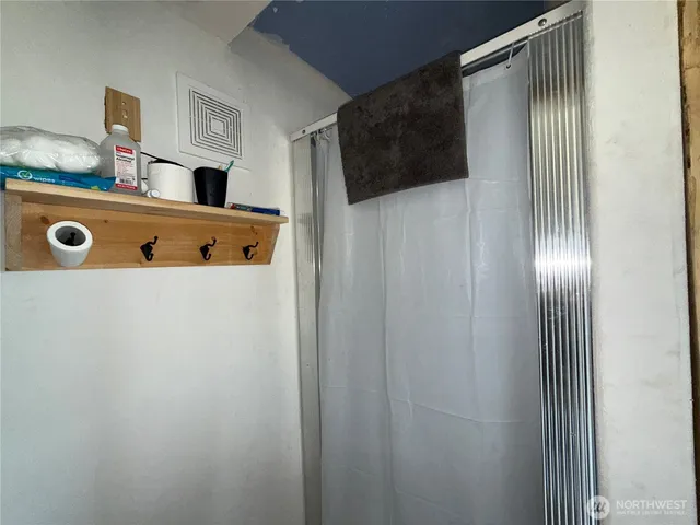 a bathroom with a toilet and a sink