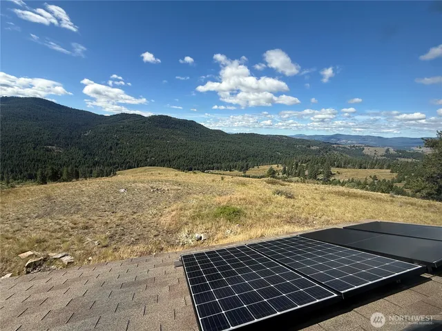 a view of mountain with lake view