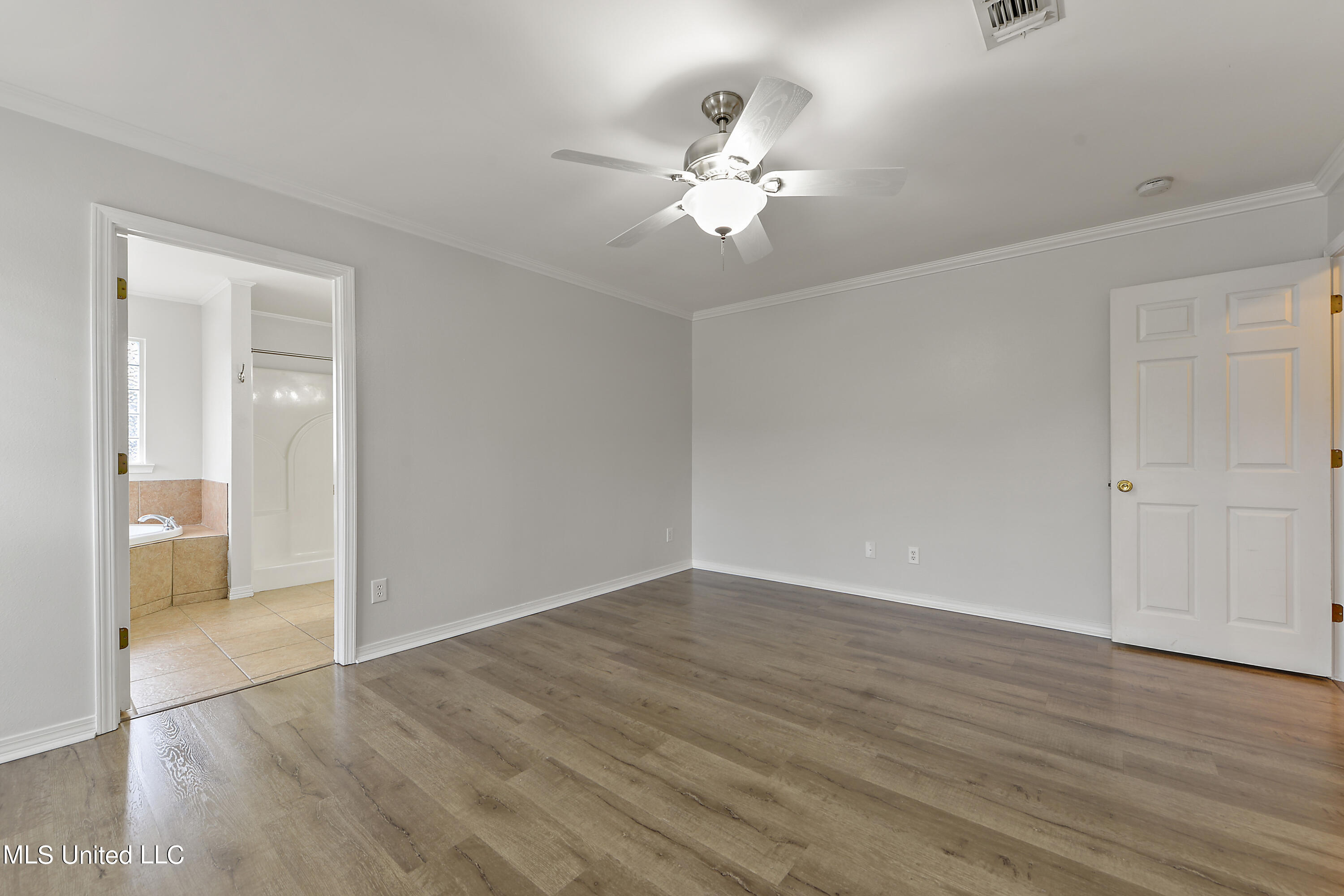 15300 Parker Road Biloxi, MS 39532 - Photo 11 of 24 Master Bedroom Moving into Bath Area